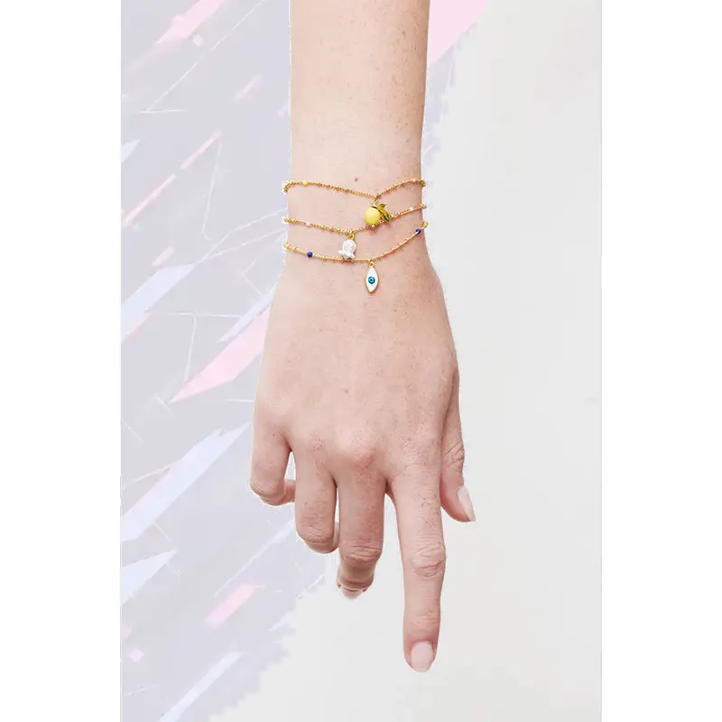 Bracelet ornemental Les Néréides avec pendentif en forme de citron doré