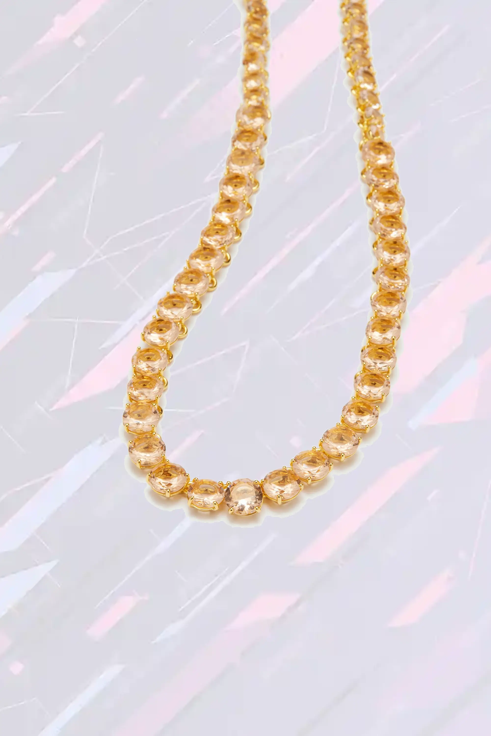 Collier Néréides élégant à perles rondes et finition diamantée rose abricot
