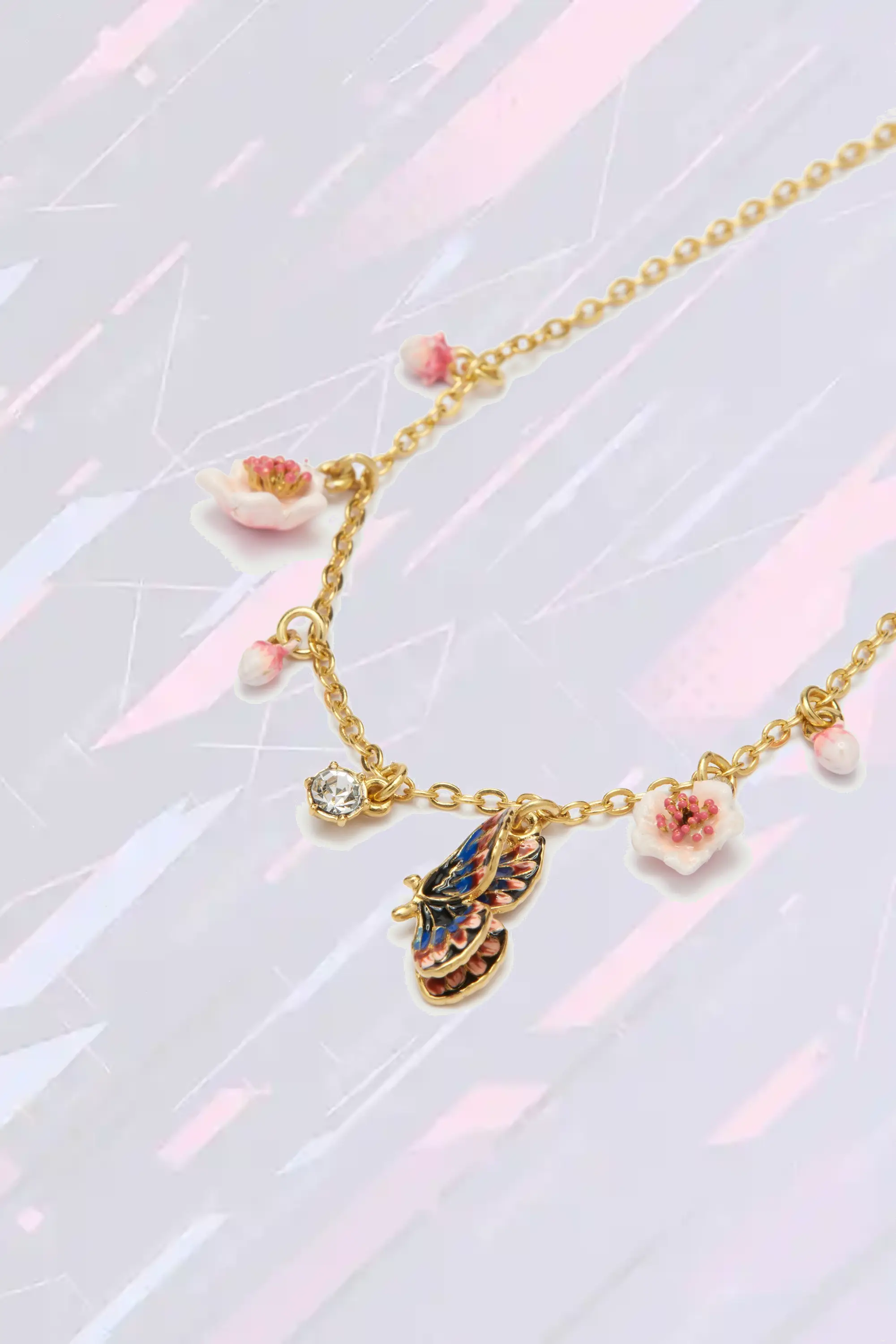 Bracelet délicat Les Néréides orné de papillons japonais et de fleurons de cerisier